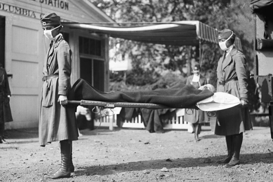 This photo made available by the Library of Congress shows a demonstration at the Red Cross Emergency Ambulance Station in Washington during the influenza pandemic of 1918. Historians think the pandemic started in Kansas in early 1918, and by winter 1919 the virus had infected a third of the global population and killed at least 50 million people, including 675,000 Americans. Some estimates put the toll as high as 100 million. (Library of Congress via AP, File)