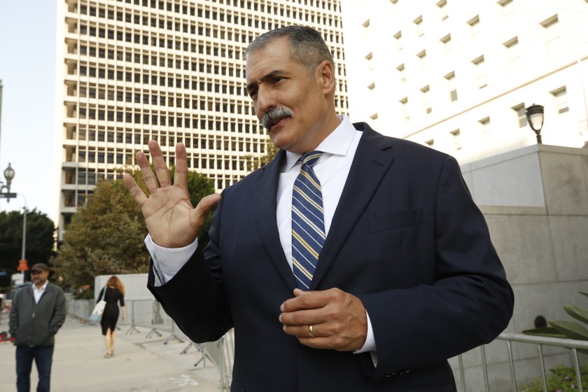 Los Angeles County Sheriff’s Cmdr. Eli Vera is seen at a news conference in front of the Hall of Justice in downtown Los Angeles on Sept. 7, 2021. (Al Seib/Los Angeles Times)