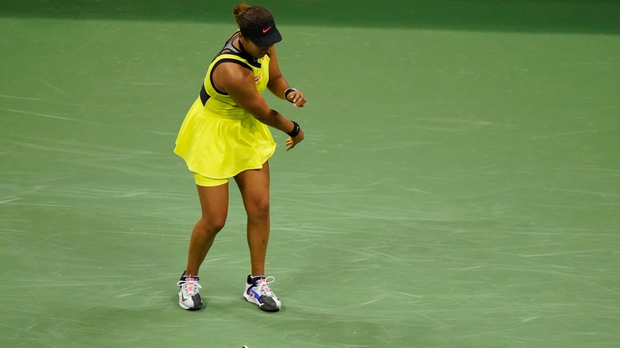 Naomi Osaka, of Japan, throws her racket down during a match against Leylah Fernandez, of Canada, at the third round of the US Open tennis championships, on Sept. 3, 2021, in New York. (Frank Franklin II/Associated Press)