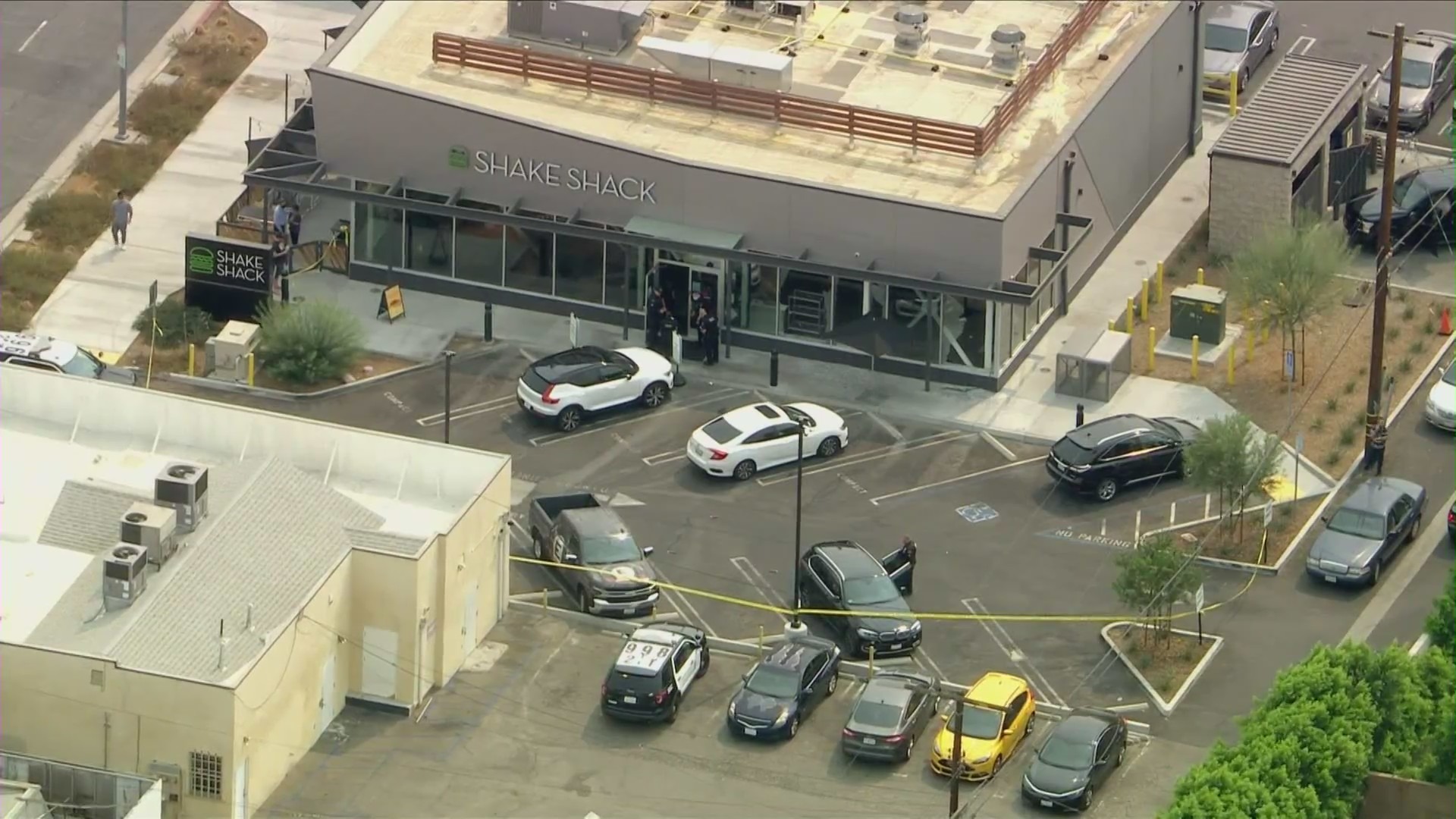 Authorities investigate after a man shot out windows of a Shake Shack in Canoga Park on Sept. 23, 2021. (KTLA)