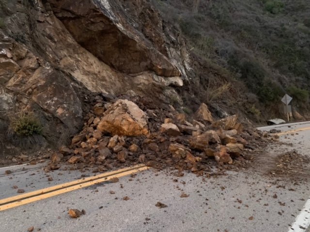 In this photo provided by Caltrans, is a rockslide on the central coast that forced closure of a long stretch of Highway 1 near Big Sur, Calif., on Oct. 27, 2021. (Caltrans via AP)