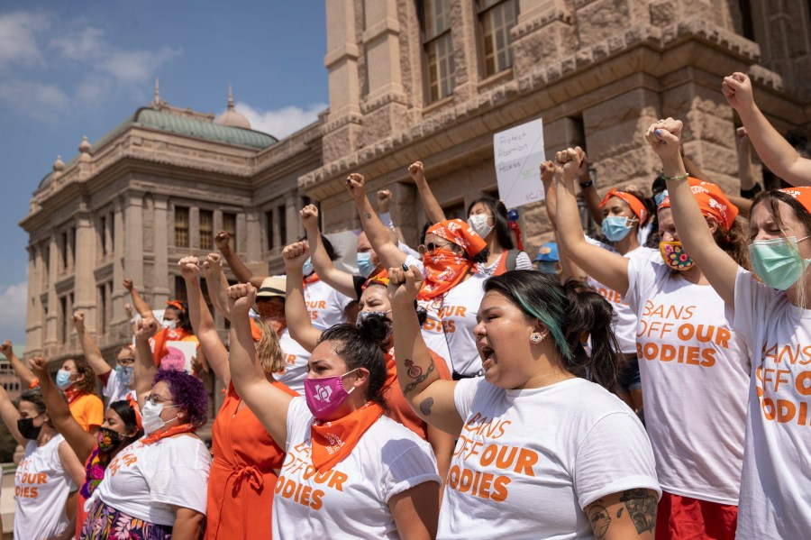 In this Wednesday, Sept. 1, 2021, file photo, women protest against Texas' restrictive abortion law at the Capitol in Austin, Texas. (Jay Janner/Austin American-Statesman via AP)