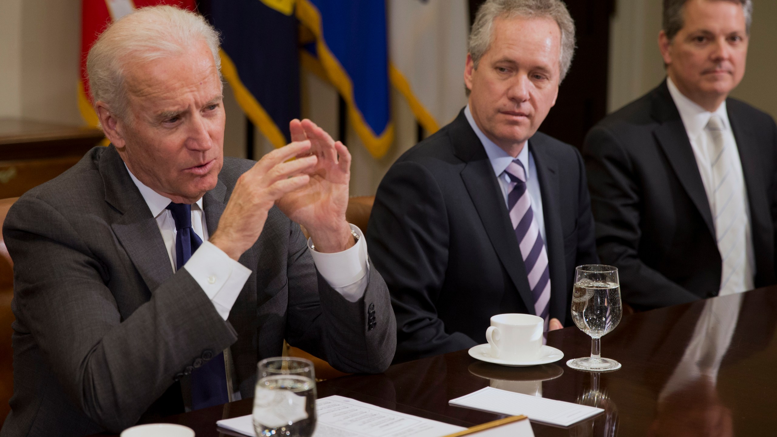 In this Thursday, Jan. 23, 2014, file photo, Vice President Joe Biden, left, speaks during a meeting with U.S. mayors including Louisville, Ky. Mayor Greg Fischer, center, to discuss workforce development, in the Roosevelt Room of the White House in Washington. (AP Photo/Jacquelyn Martin, File)