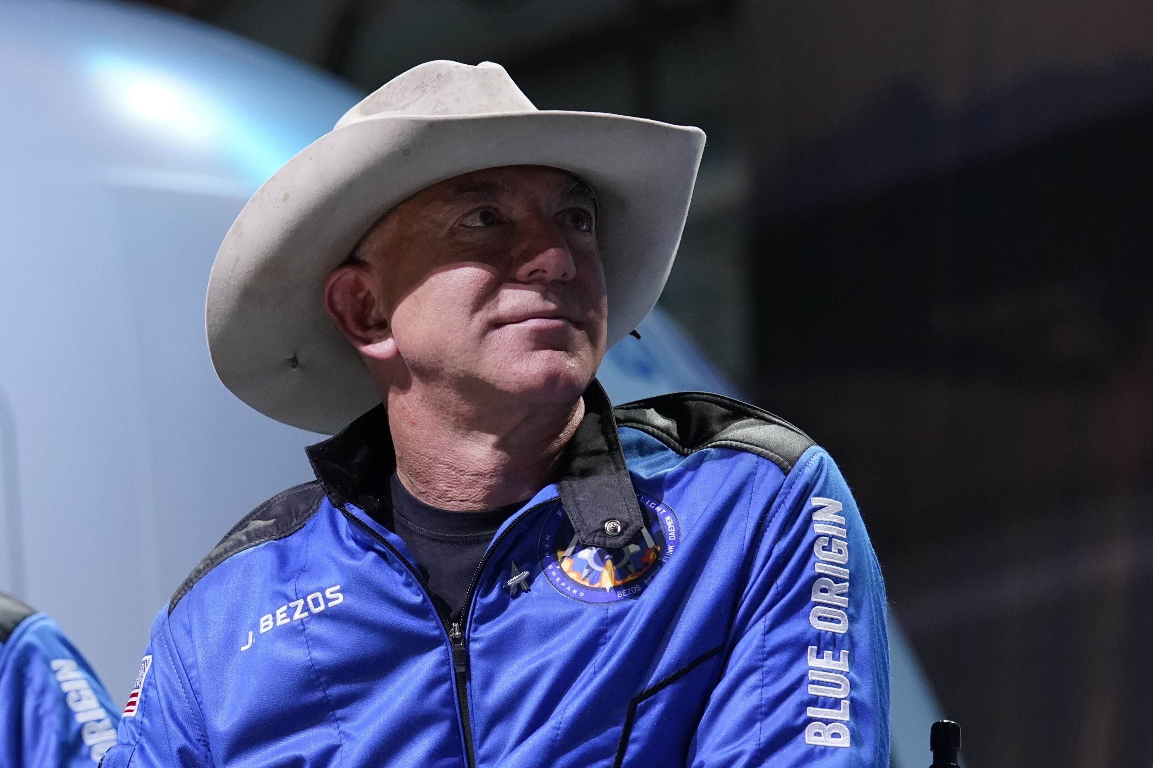 In this July 20, 2021 file photo, Jeff Bezos, founder of Amazon and space tourism company Blue Origin, participates in post launch briefing from its spaceport near Van Horn, Texas. (AP Photo/Tony Gutierrez)