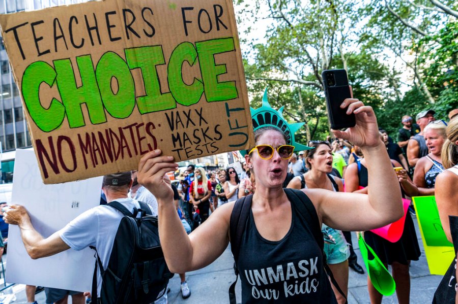 Teachers protest against the COVID-19 vaccination mandates in New York on Wednesday Aug. 25, 2021. (AP Photo/Mary Altaffer, File)