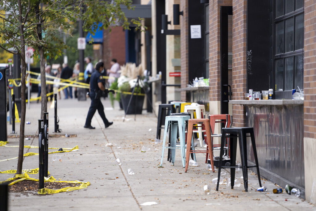 Investigators processed the chaotic scene of a multiple shooting at the bar Truck Park in St. Paul, Minn., that happened after midnight on Sunday, Oct. 10, 2021. (Renee Jones Schneider/Star Tribune via AP)