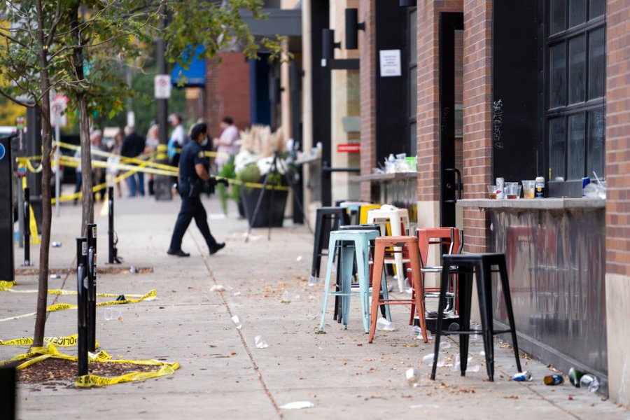 Investigators processed the chaotic scene of a multiple shooting at the bar Truck Park in St. Paul, Minn., that happened after midnight on Sunday, Oct. 10, 2021. (Renee Jones Schneider/Star Tribune via AP)