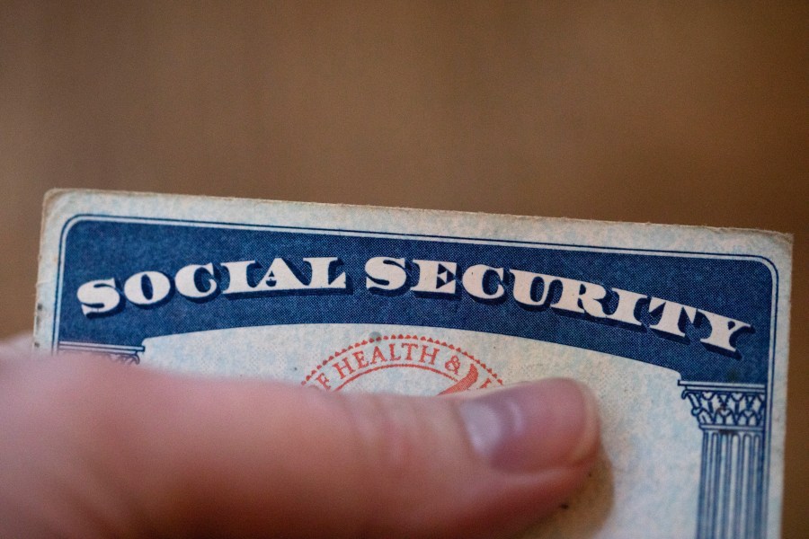 This Tuesday, Oct. 12, 2021, photo shows a Social Security card in Tigard, Ore. Millions of retirees on Social Security will get a 5.9% boost in benefits for 2022. The biggest cost-of-living adjustment in 39 years follows a burst in inflation as the economy struggles to shake off the drag of the coronavirus pandemic. (AP Photo/Jenny Kane)