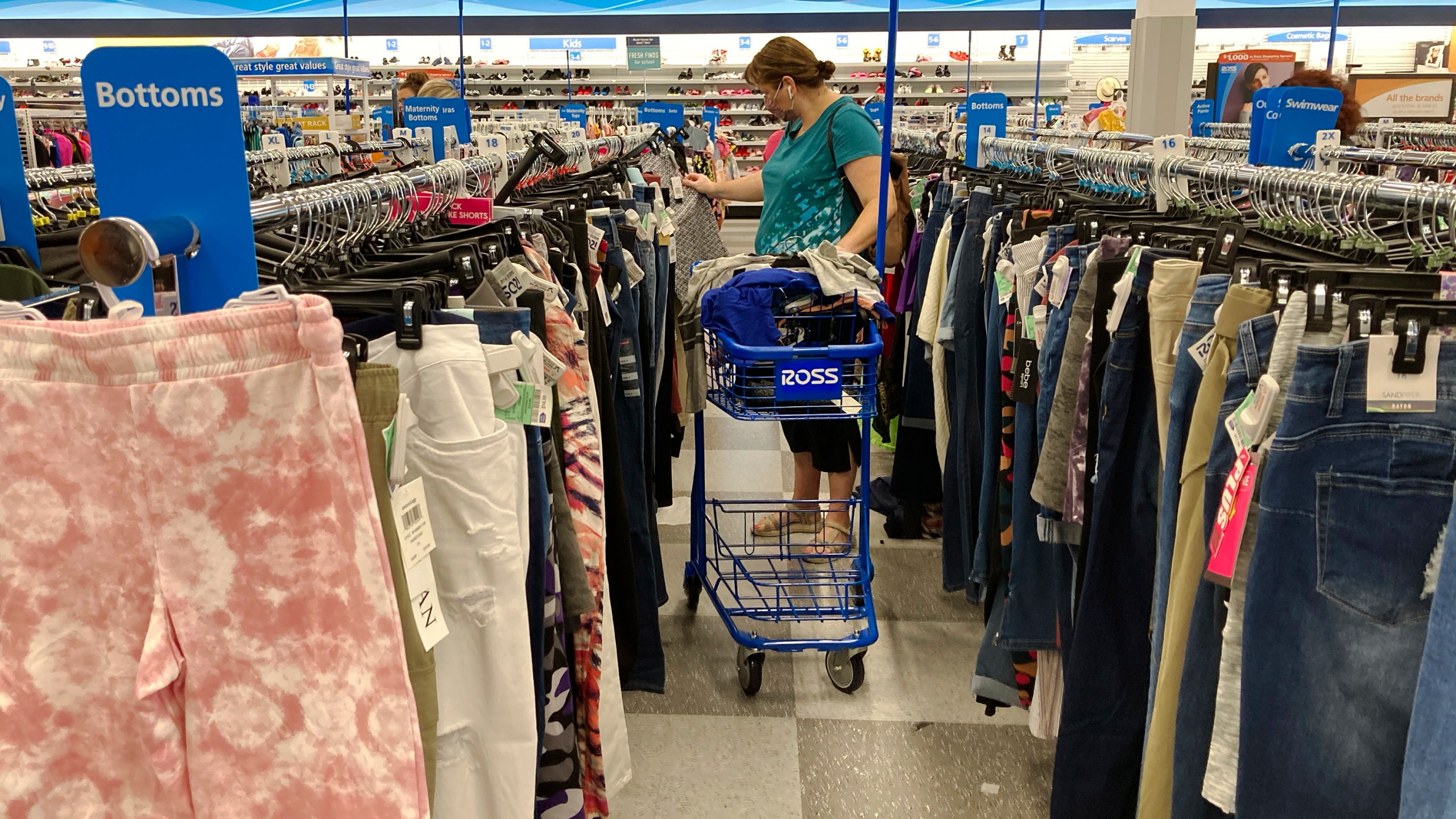 In this July 21, 2021 photo, a consumer shops at a retail store in Morton Grove, Ill. Consumer prices rose 0.4% last month, slightly higher than August’s gain and pushing annual inflation back to the highest increase in 13 years. The consumer price index rose 5.4% in September from a year ago, up slightly from August’s gain of 5.3% and matching the increases in June and July. (AP Photo/Nam Y. Huh)