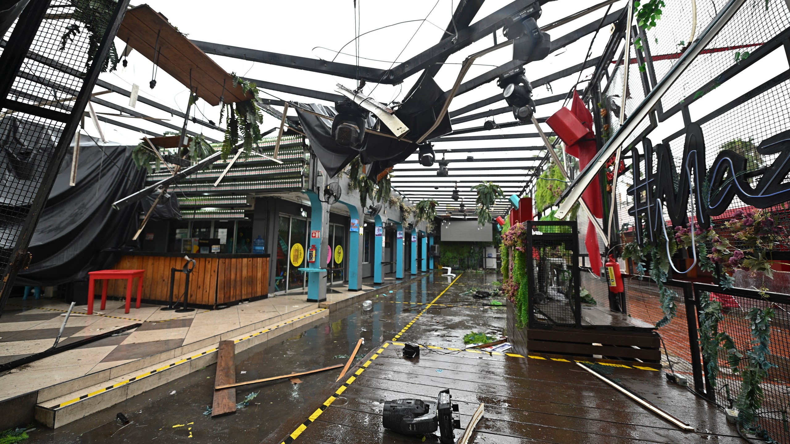 A commercial area is damaged after the passing of Hurricane Pamela in Mazatlan, Mexico, on Oct. 13, 2021. (Roberto Echeagaray / Associated Press)