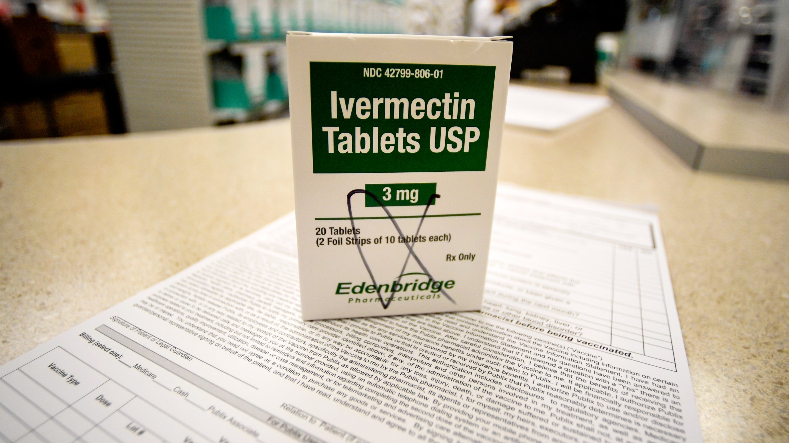 A box of ivermectin is shown in a pharmacy as pharmacists work in the background, Thursday, Sept. 9, 2021, in Ga. At least two dozen lawsuits have been filed around the U.S., many in recent weeks by people seeking to force hospitals to give their COVID-stricken loved ones ivermectin, a drug for parasites that has been promoted by conservative commentators as a treatment despite a lack of conclusive evidence that it helps people with the virus. (AP Photo/Mike Stewart)A box of ivermectin is shown in a pharmacy as pharmacists work in the background, Thursday, Sept. 9, 2021, in Ga. At least two dozen lawsuits have been filed around the U.S., many in recent weeks by people seeking to force hospitals to give their COVID-stricken loved ones ivermectin, a drug for parasites that has been promoted by conservative commentators as a treatment despite a lack of conclusive evidence that it helps people with the virus. (AP Photo/Mike Stewart)