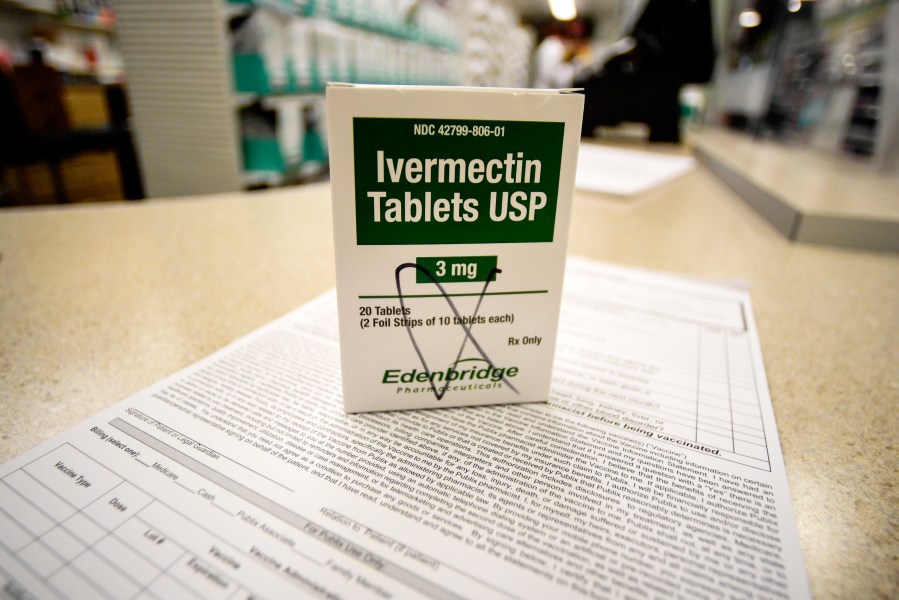 A box of ivermectin is shown in a pharmacy as pharmacists work in the background, Thursday, Sept. 9, 2021, in Ga. At least two dozen lawsuits have been filed around the U.S., many in recent weeks by people seeking to force hospitals to give their COVID-stricken loved ones ivermectin, a drug for parasites that has been promoted by conservative commentators as a treatment despite a lack of conclusive evidence that it helps people with the virus. (AP Photo/Mike Stewart)A box of ivermectin is shown in a pharmacy as pharmacists work in the background, Thursday, Sept. 9, 2021, in Ga. At least two dozen lawsuits have been filed around the U.S., many in recent weeks by people seeking to force hospitals to give their COVID-stricken loved ones ivermectin, a drug for parasites that has been promoted by conservative commentators as a treatment despite a lack of conclusive evidence that it helps people with the virus. (AP Photo/Mike Stewart)