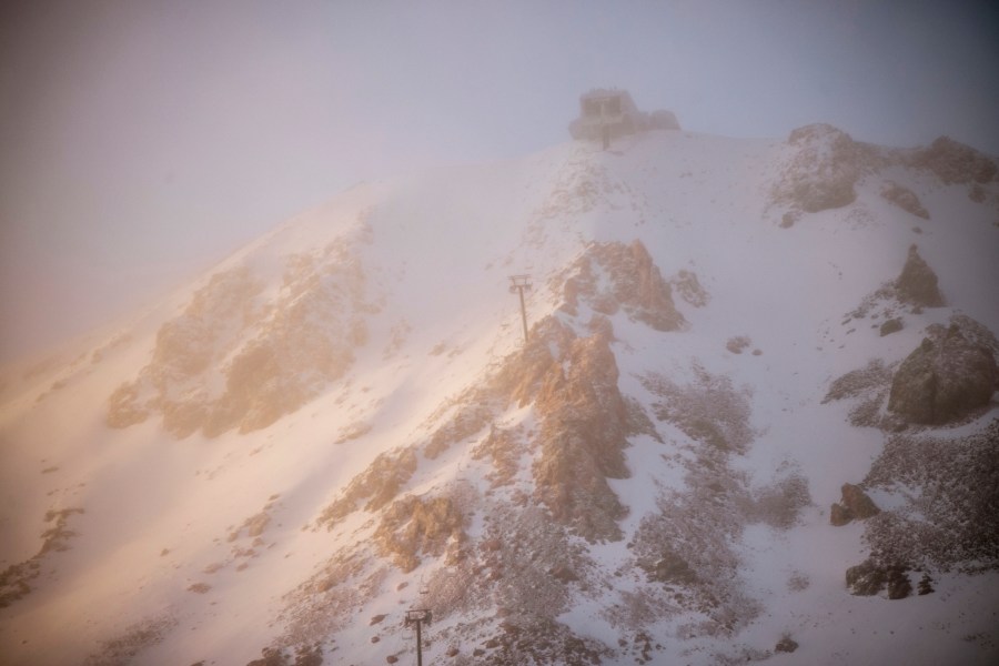 Snow falls on Mammoth Mountain Monday, Oct. 18, 2021, in Mammoth Lakes, Calif. (Peter Morning/MMSA via AP)