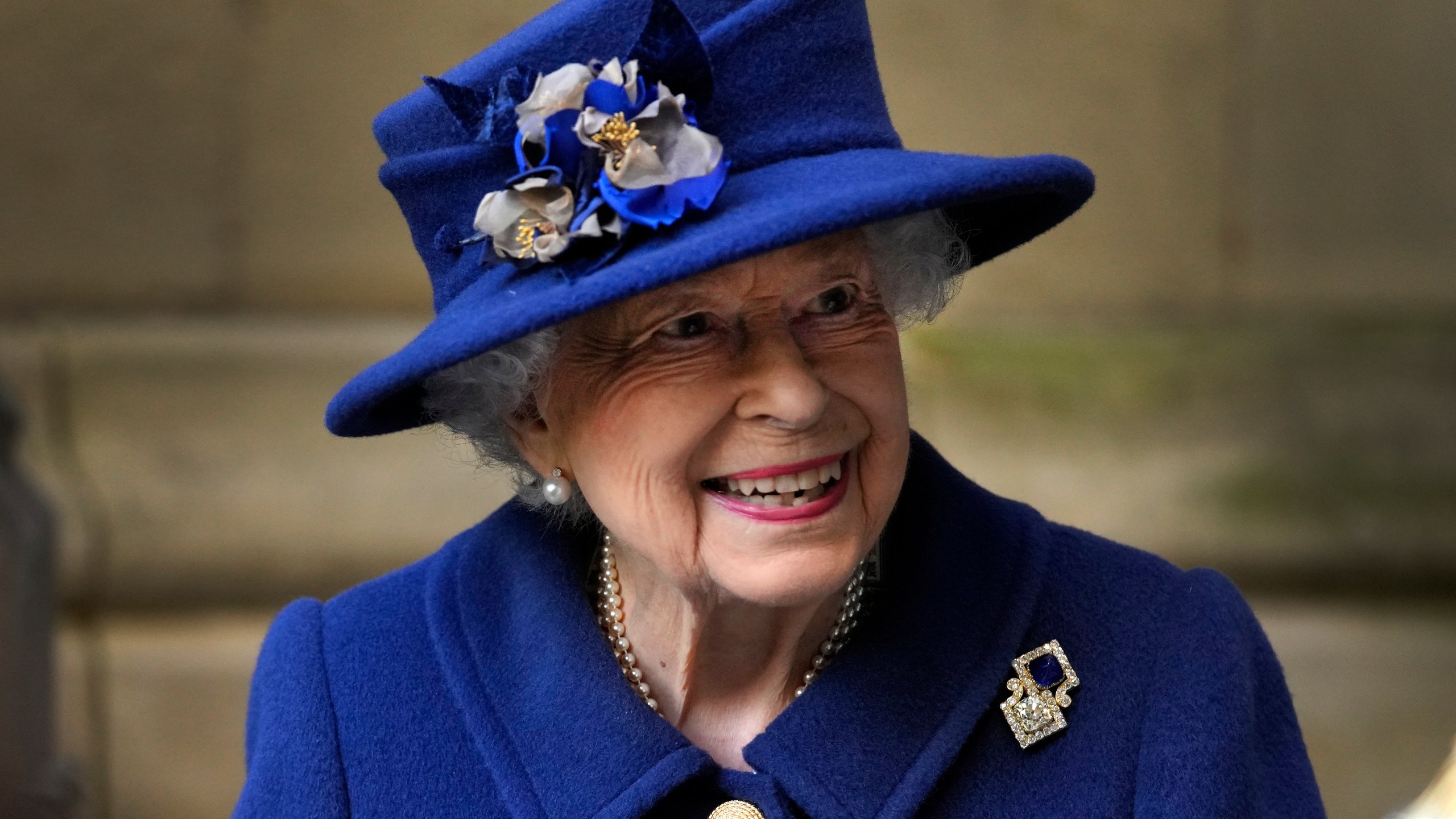 In this Oct. 12, 2021, file photo, Britain's Queen Elizabeth II, Patron, leaves after attending a Service of Thanksgiving to mark the Centenary of the Royal British Legion at Westminster Abbey in London. (AP Photo/Frank Augstein, Pool, File)