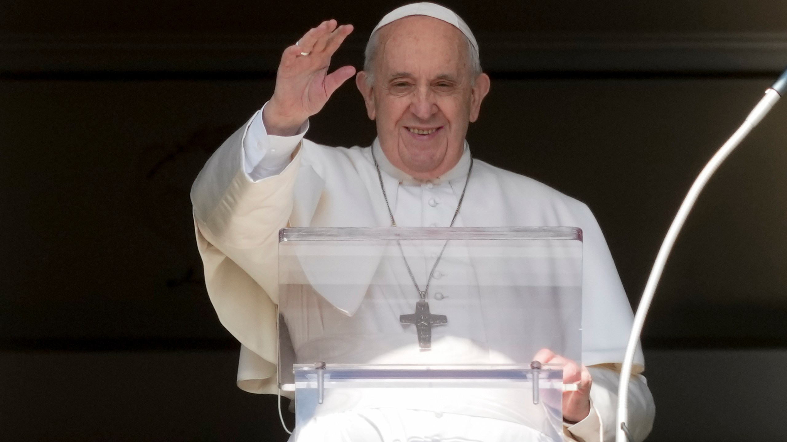 Pope Francis delivers his blessing as he recites the Angelus noon prayer from the window of his studio overlooking St.Peter's Square, at the Vatican, Sunday, Oct. 24, 2021. (AP Photo/Andrew Medichini)