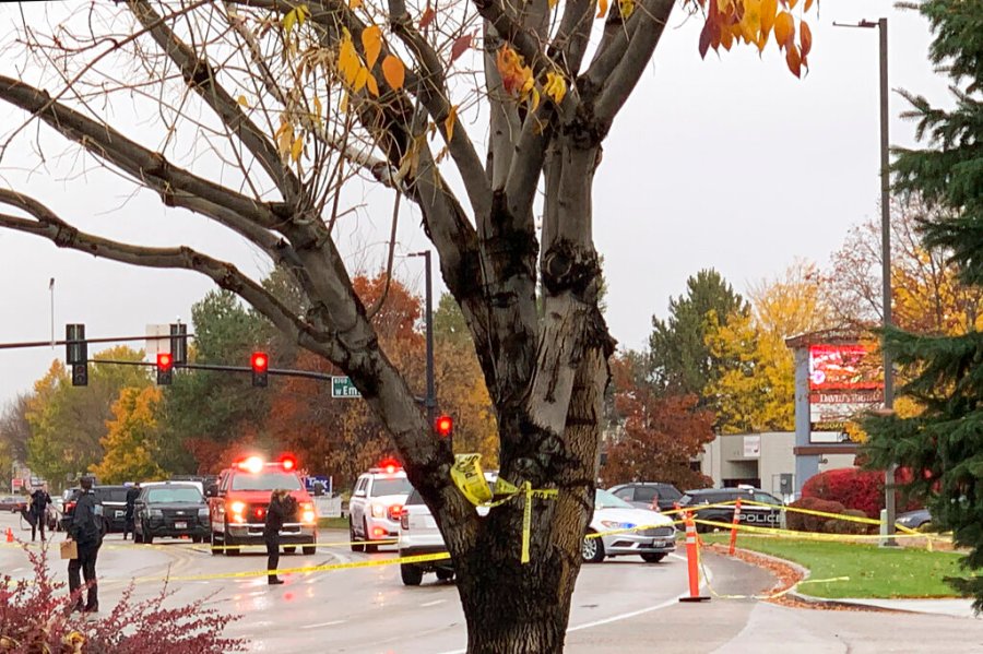 Police close off a street outside a shopping mall after a shooting in Boise, Idaho on Monday, Oct. 25, 2021. (AP Photo/Rebecca Boone)