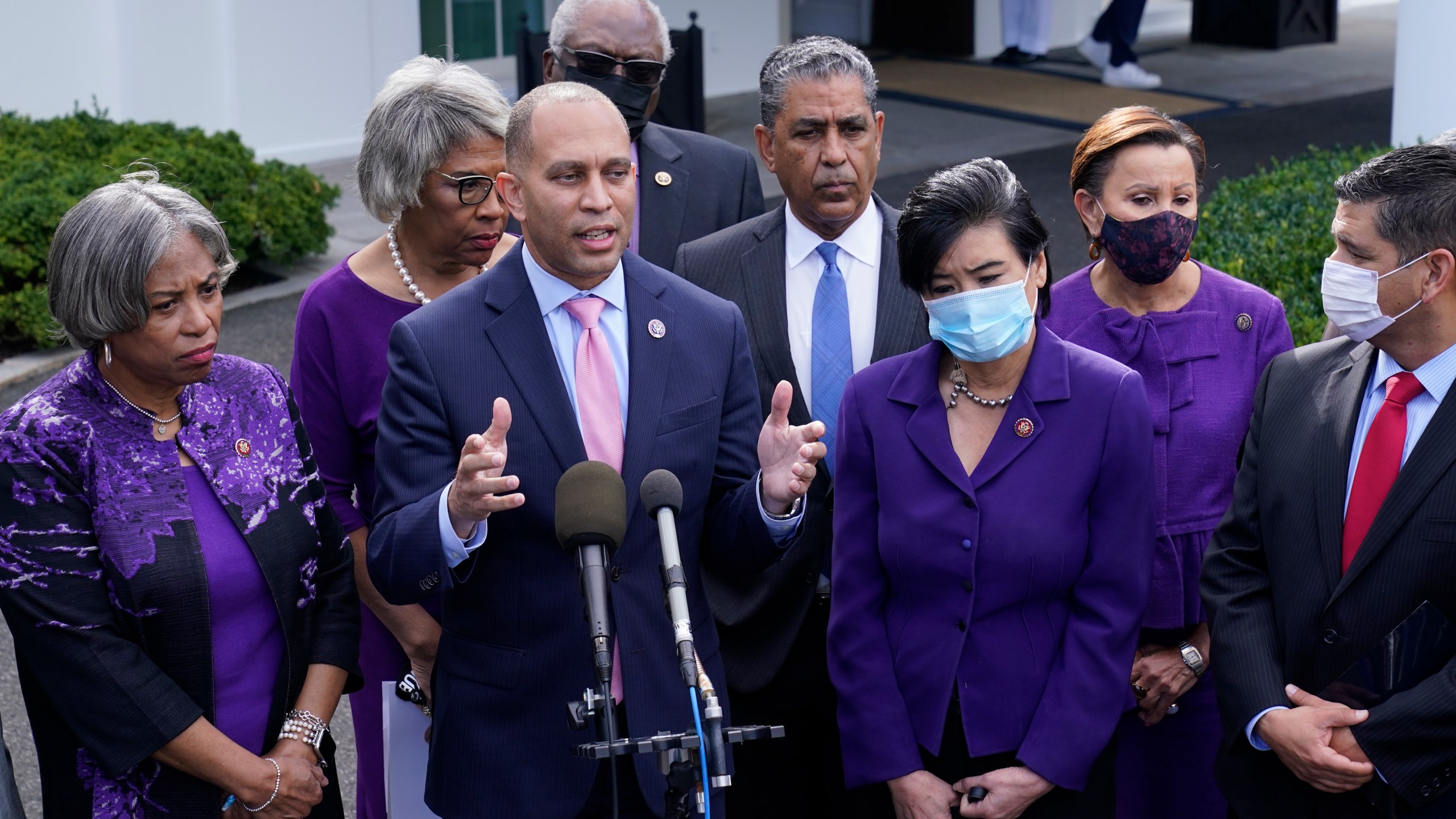 Rep. Hakeem Jeffries, D-N.Y., standing with other House Democrats, talks to reporters outside the West Wing of the White House in Washington, Tuesday, Oct. 26, 2021, following a meeting with President Joe Biden to work out details of the Biden administration's domestic agenda. (AP Photo/Susan Walsh)