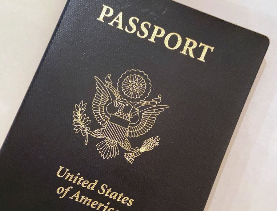 This May 25, 2021 file photo shows a U.S. Passport cover in Washington. The United States has issued its first passport with an “X” gender designation, a milestone in the recognition of the rights of people who don't identify as male or female. (AP Photo/Eileen Putman)