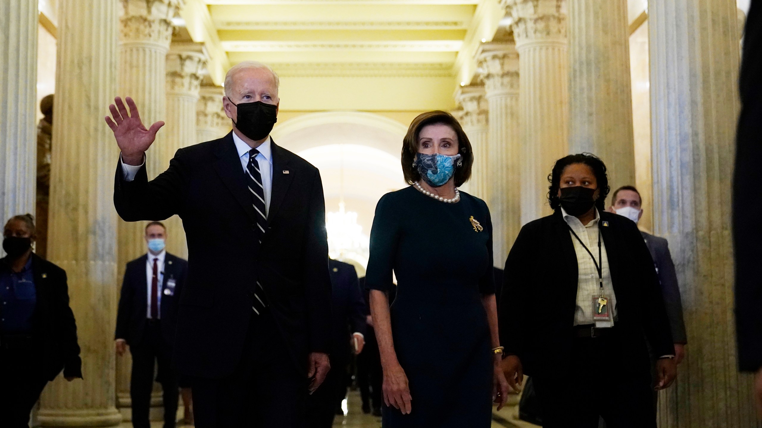 President Biden walks with House Speaker Nancy Pelosi on Capitol Hill in Washington, Thursday, Oct. 28, 2021, following a visit to meet with House Democrats. (AP Photo/Susan Walsh)