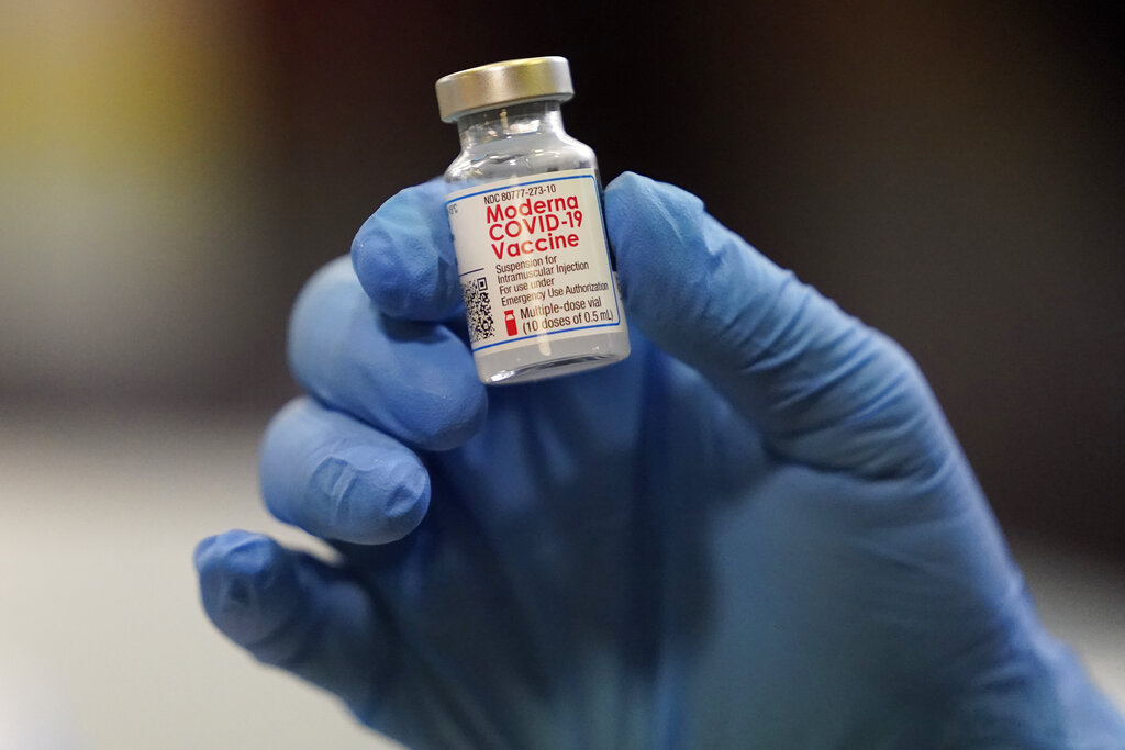 A vial of the Moderna COVID-19 vaccine at a pop-up vaccine clinic in Salt Lake City. (AP Photo/Rick Bowmer, File)