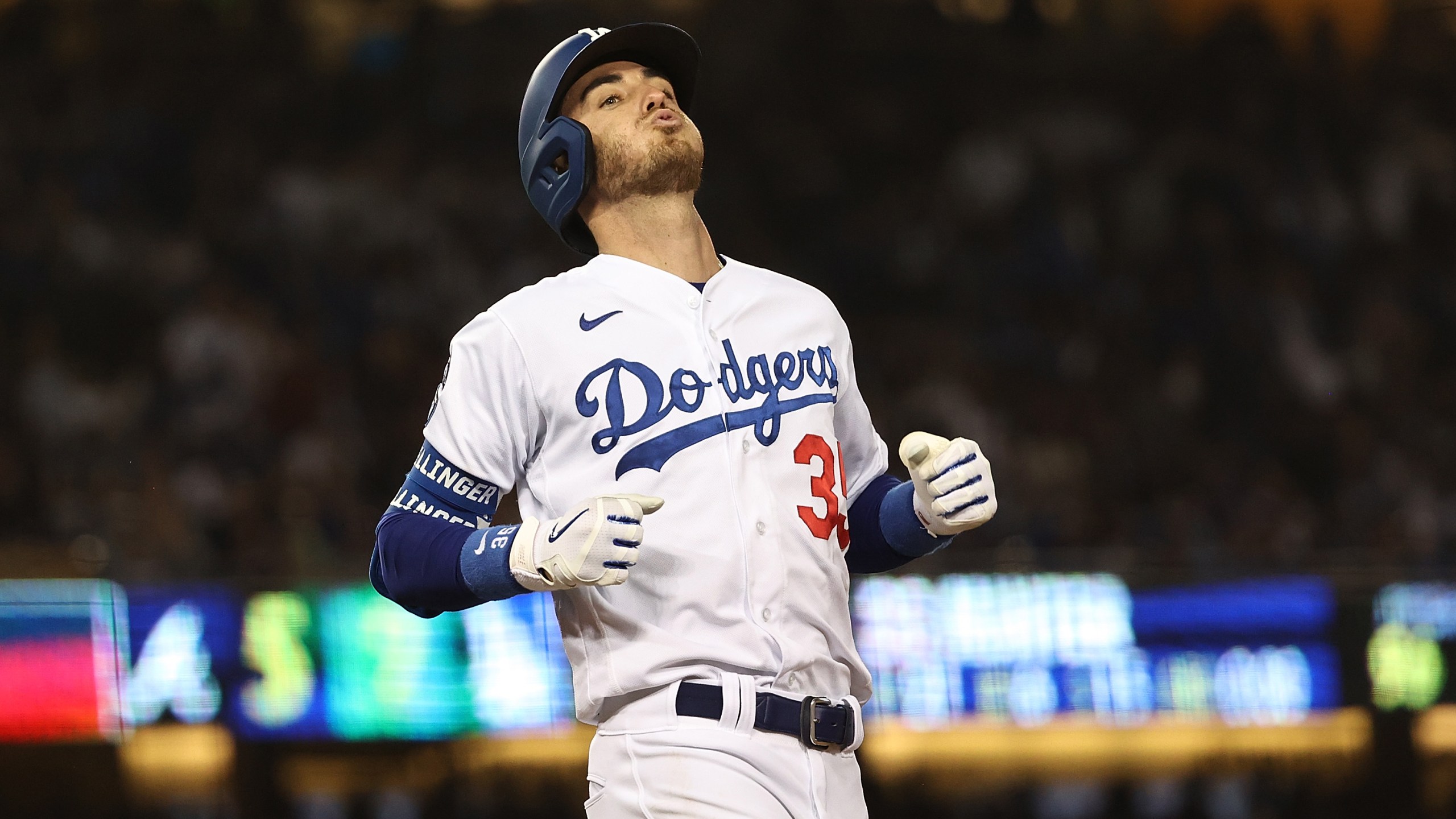 Cody Bellinger #35 of the Los Angeles Dodgers flies out during the seventh inning of Game Four of the National League Championship Series against the Atlanta Braves at Dodger Stadium on October 20, 2021 in Los Angeles, California. (Photo by Sean M. Haffey/Getty Images)