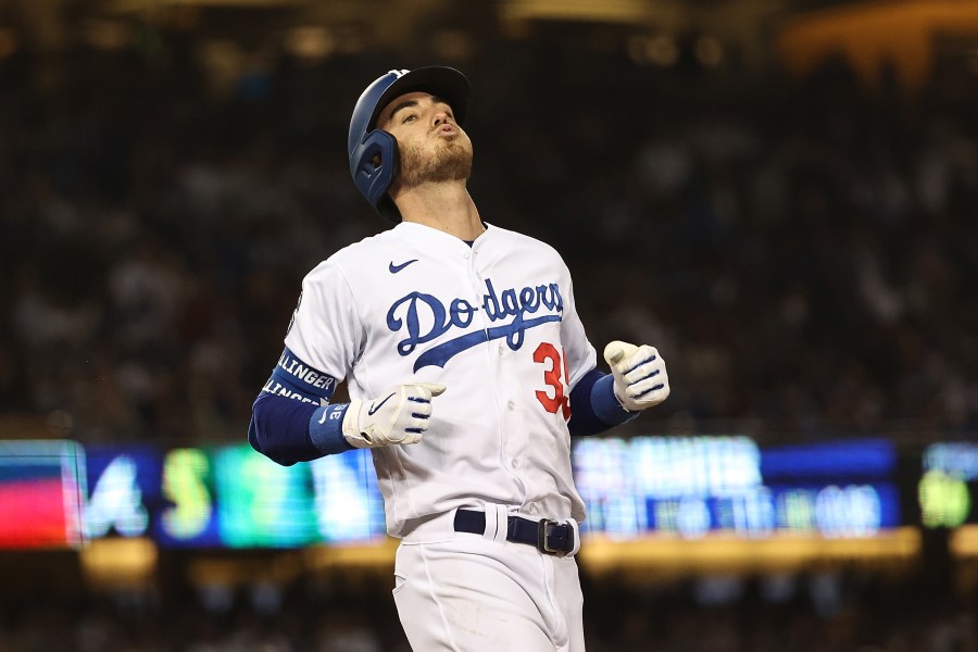 Cody Bellinger #35 of the Los Angeles Dodgers flies out during the seventh inning of Game Four of the National League Championship Series against the Atlanta Braves at Dodger Stadium on October 20, 2021 in Los Angeles, California. (Photo by Sean M. Haffey/Getty Images)