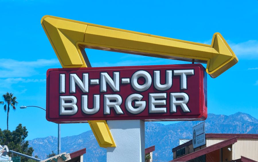 The signs points to an In-N-Out Burger restaurant in Alhambra on Aug. 30, 2018. (FREDERIC J. BROWN/AFP via Getty Images)