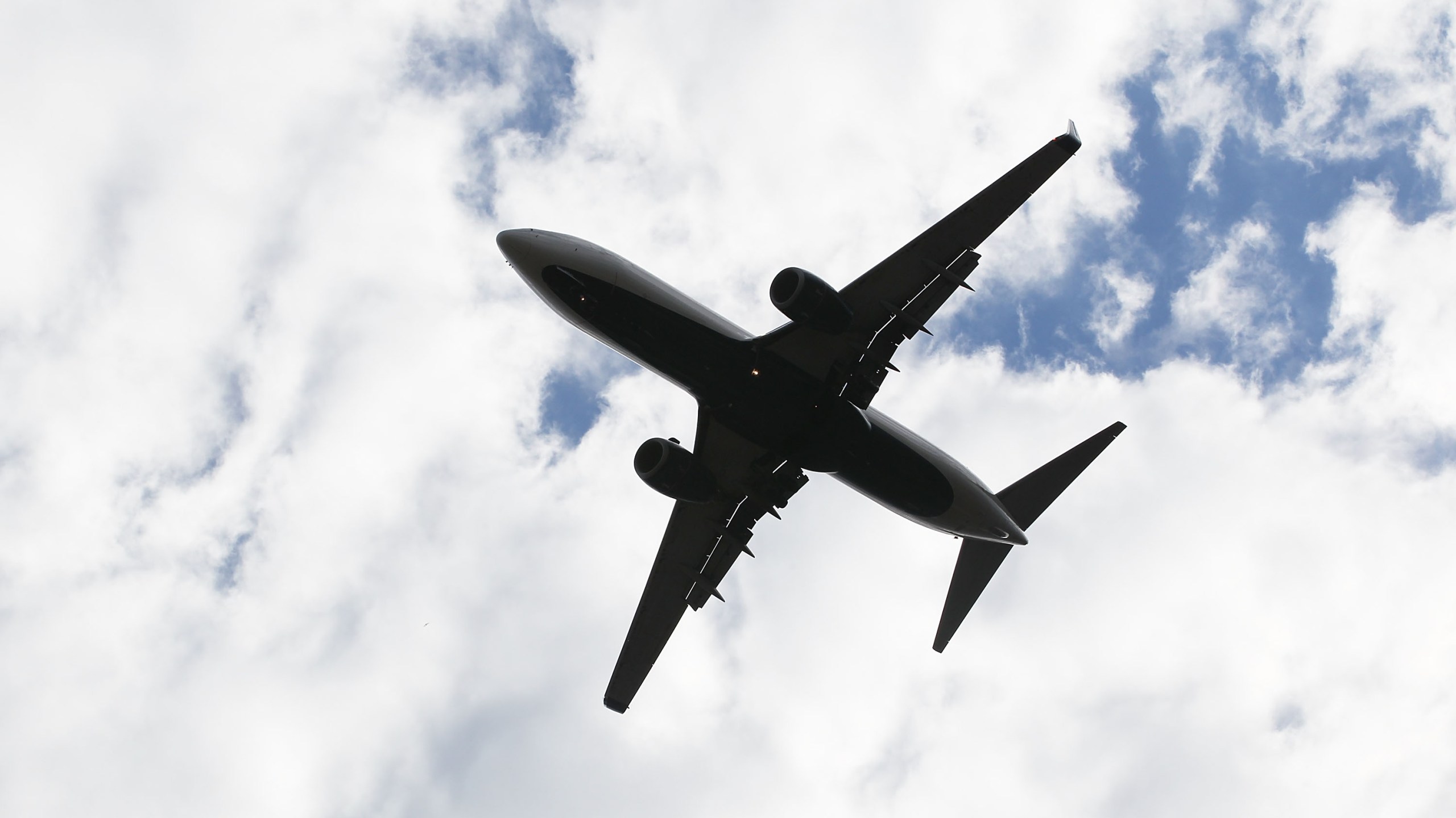 An aircraft is seen flying overhead in Raleigh, North Carolina, on Nov. 29, 2010. (Bruce Bennett / Getty Images)