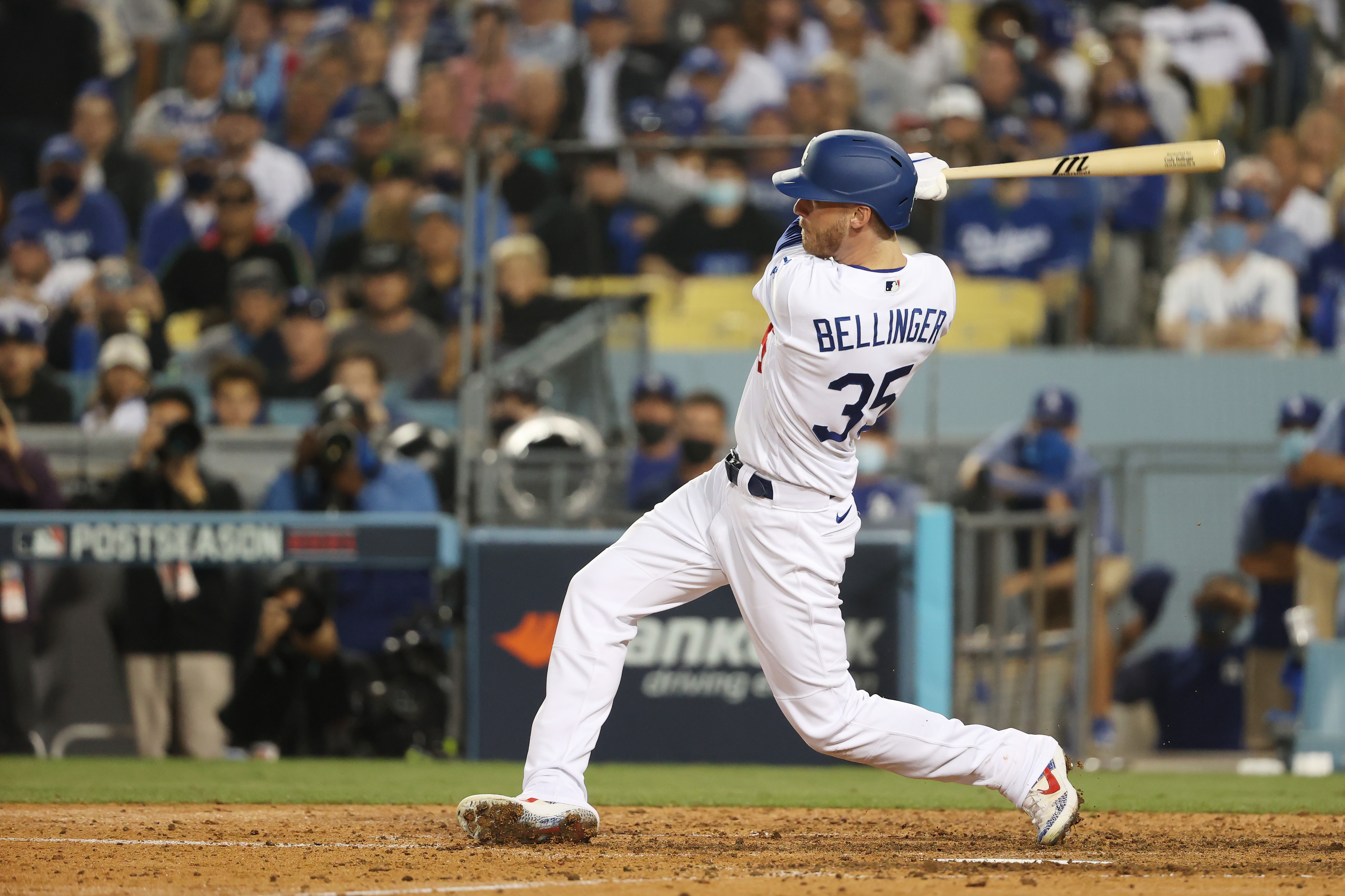 Cody Bellinger of the Los Angeles Dodgers hits a single in the seventh inning against the St. Louis Cardinals during the National League Wild Card Game at Dodger Stadium on Oct. 6, 2021. (Sean M. Haffey / Getty Images)