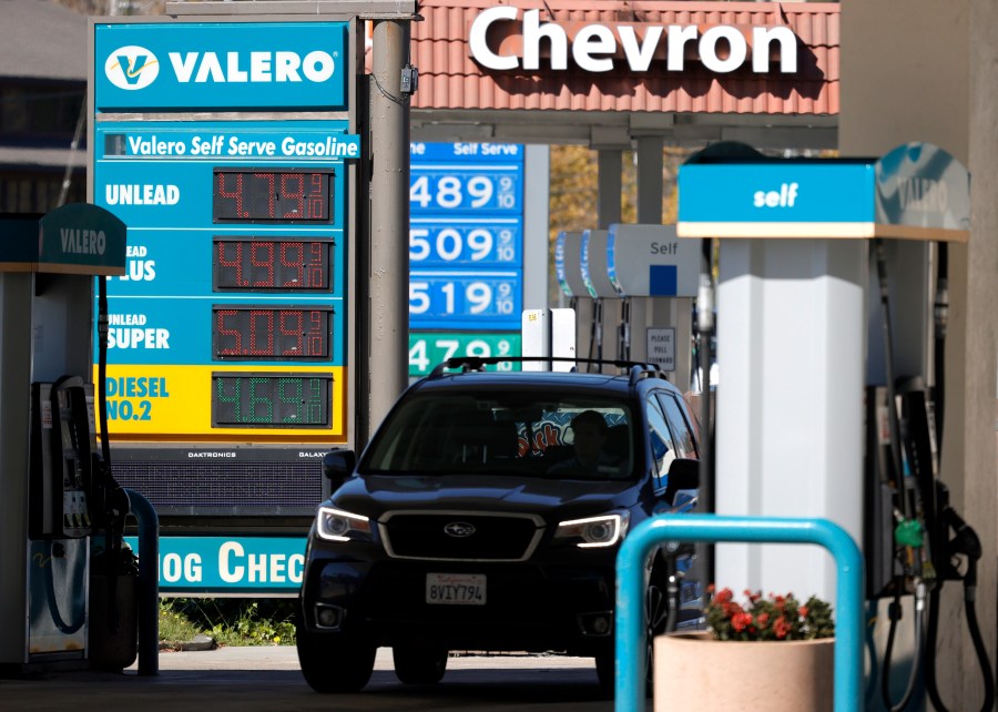 Gas prices nearing $5.00 per gallon are displayed at Valero and Chevron stations on October 12, 2021 in Mill Valley. (Justin Sullivan/Getty Images)