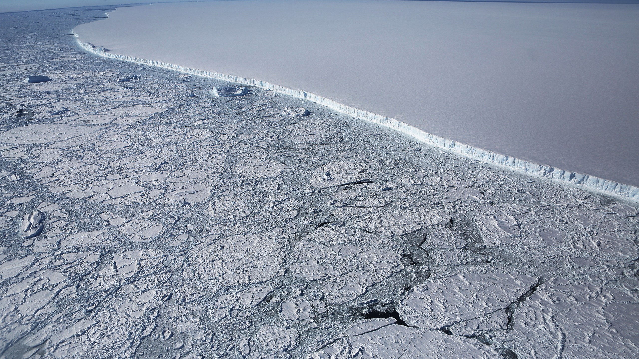 The western edge of the famed iceberg A-68, calved from the Larsen C ice shelf, is seen from NASA's Operation IceBridge research aircraft, near the coast of the Antarctic Peninsula region, on Oct. 31, 2017. (Mario Tama / Getty Images)