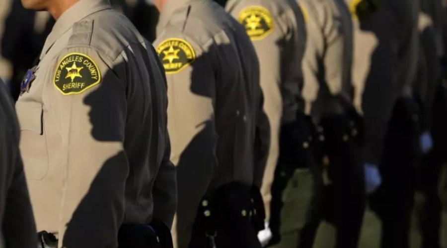 A 64-year-old man was arrested on Oct. 23, 2021, after he drove his Jeep Wrangler into a crowd of people protesting vaccine mandates in Palmdale, injuring one woman, Los Angeles County Sheriff’s Department officials said.(Mel Melcon / Los Angeles Times)