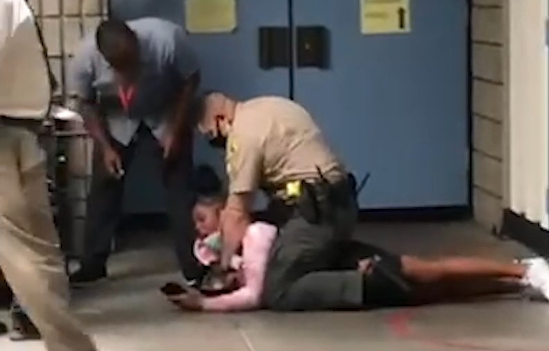 A 16-year-old student said she was slammed to the ground by an LASD deputy assigned to her school on Aug. 30, 2021. (Los Angeles Times)