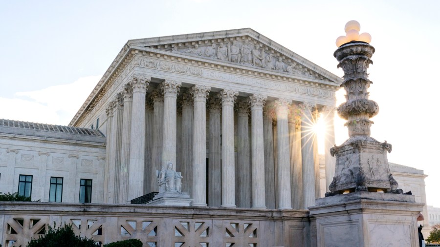 In this Nov. 10, 2020, file photo the sun rises behind the U.S. Supreme Court in Washington. (AP Photo/Alex Brandon, File)