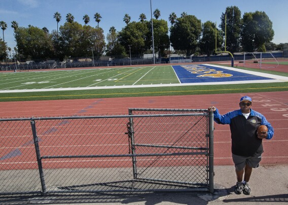 Crenshaw High School football coach Robert Garrett, seen in this undated photo, tells his players that he understands their COVID-vaccine hesitancy. He was reluctant himself. (Mel Melcon / Los Angeles Times)