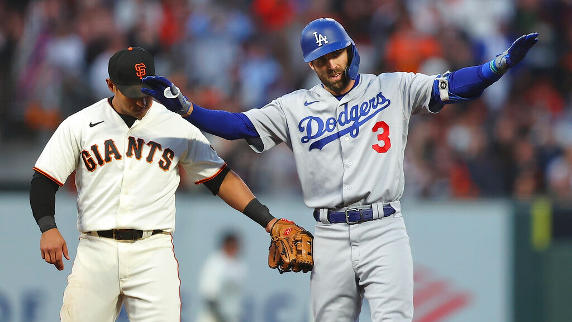 Los Angeles Dodgers' Chris Taylor gestures after hitting a double during the National League Division Series Saturday, Oct. 9, 2021, in San Francisco. (AP Photo/John Hefti)