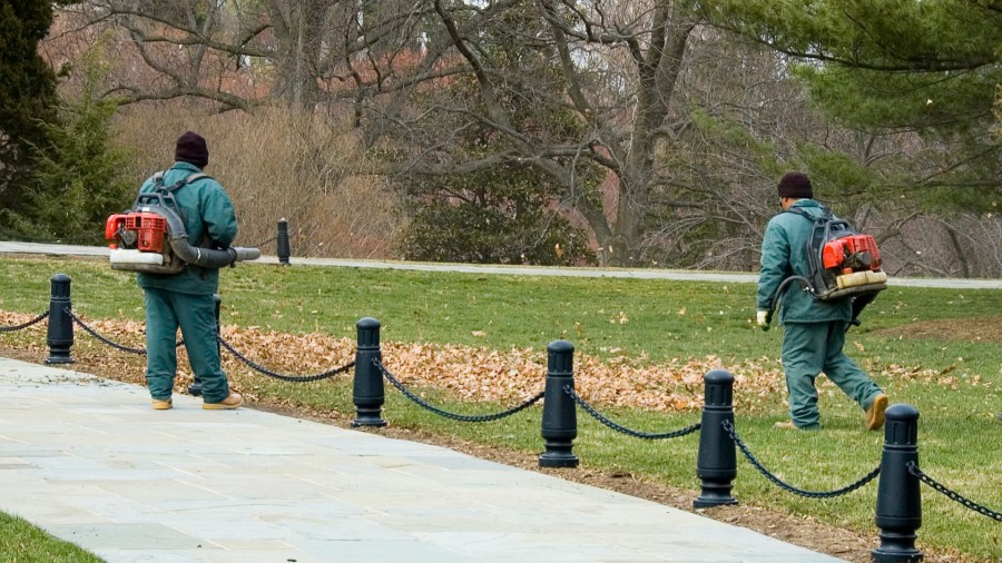 Workers use gas-powered leaf blowers in this undated file image. (Getty Images)