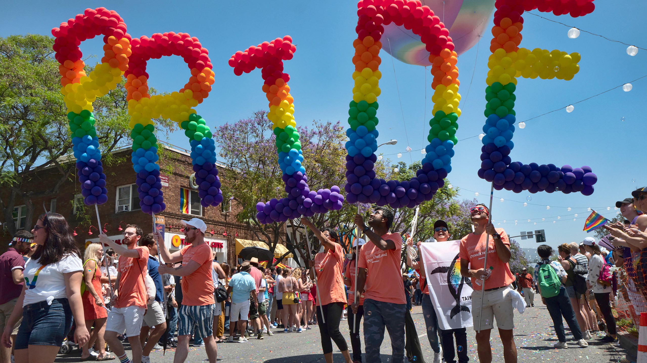 This June 9, 2019, file photo shows participants in the 49th annual Los Angeles Pride Parade in West Hollywood. (AP Photo/Richard Vogel, File)