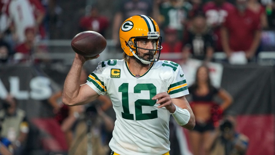 Green Bay Packers quarterback Aaron Rodgers (12) throws during the first half of an NFL football game against the Arizona Cardinals, Thursday, Oct. 28, 2021, in Glendale, Ariz. (AP Photo/Rick Scuteri)