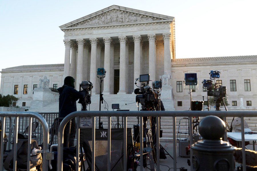 The U.S. Supreme Court is seen on Capitol Hill in Washington, Wednesday, Nov. 3, 2021, as television cameras are set up. The Supreme Court is set to hear arguments in a gun rights case that centers on New York’s restrictive gun permit law and whether limits the state has placed on carrying a gun in public violate the Second Amendment. (AP Photo/Jose Luis Magana)