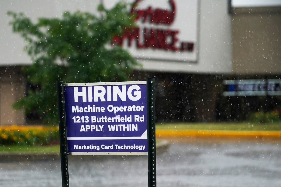 A hiring sign is displayed in Downers Grove, Ill., on June 24, 2021. (AP Photo/Nam Y. Huh, File)