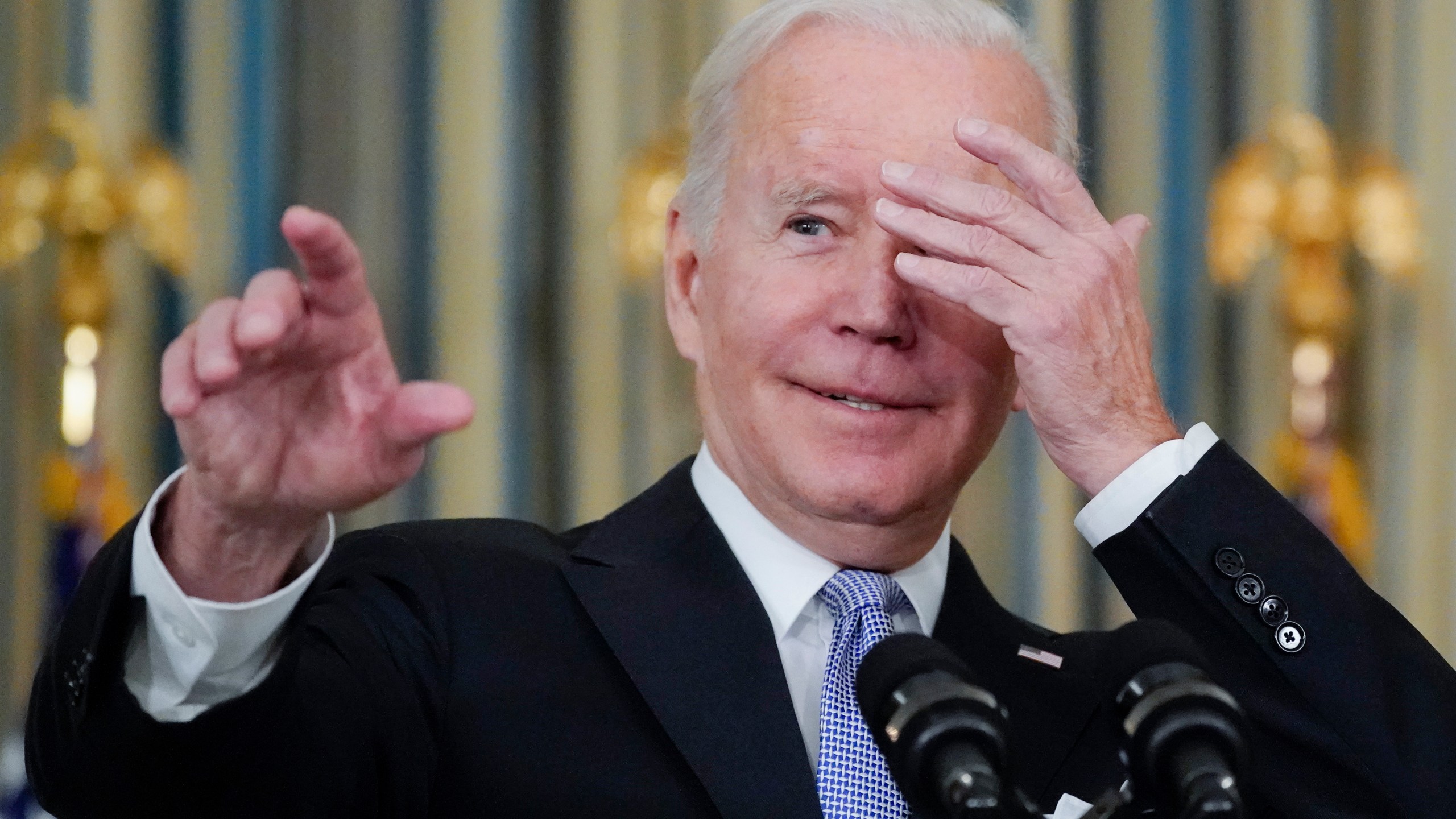 President Joe Biden jokes about which reporter to call on for a question as he speaks about the bipartisan infrastructure bill in the State Dinning Room of the White House, Saturday, Nov. 6, 2021, in Washington. (AP Photo/Alex Brandon)