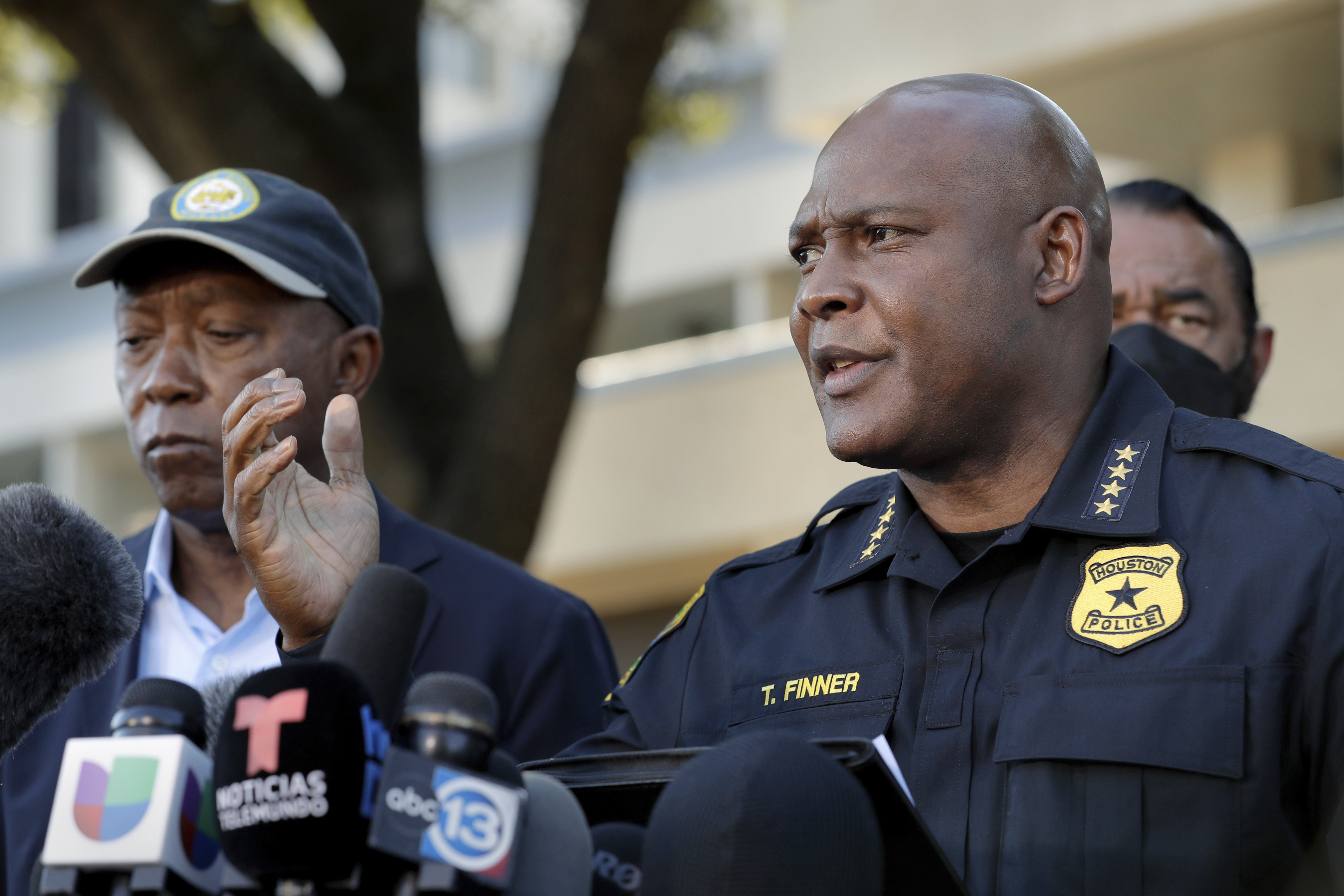 Houston Police Chief Troy Finner, right, speaks next to Mayor Sylvester Turner, left, during a news conference in Houston on Nov. 6, 2021 after several people died and scores were injured during a music festival the night before. (Michael Wyke/Associated Press)