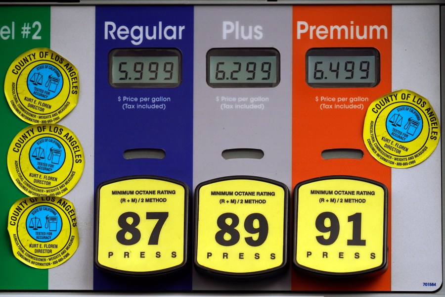 High gas prices are posted at a full service gas station in Beverly Hills, Calif., Sunday, Nov. 7, 2021. (AP Photo/Damian Dovarganes)