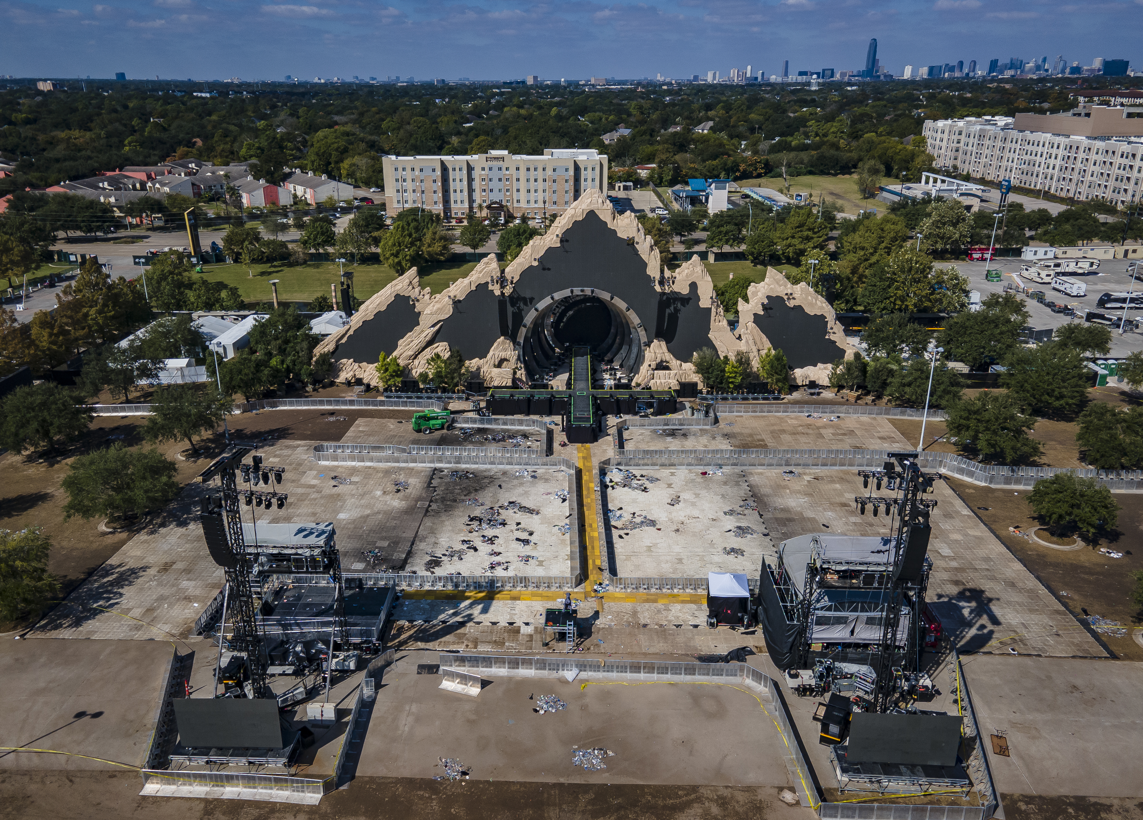 The Astroworld main stage where Travis Scott was performing, where a surging crowd killed eight people, sits full of debris from the concert, in a parking lot at NRG Center on Nov. 8, 2021, in Houston. ( Mark Mulligan/Houston Chronicle via AP)