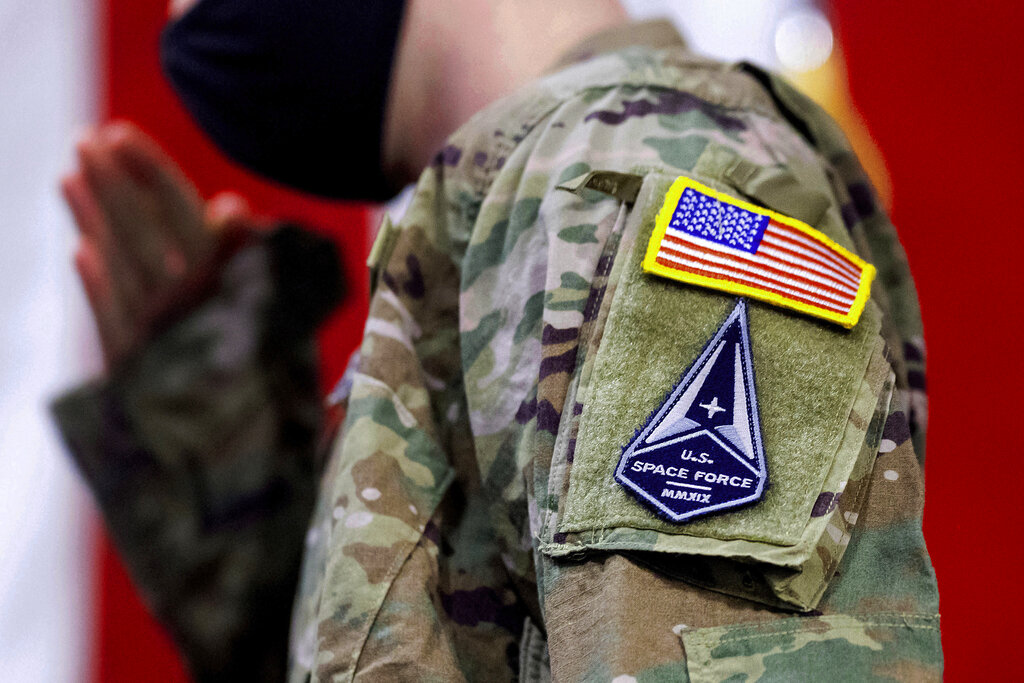 A solider wears a U.S. Space Force uniform during a ceremony for U.S. Air Force airmen transitioning to U.S. Space Force guardian designations at Travis Air Force Base, Calif., Feb. 12, 2021. (AP Photo/Noah Berger, File)