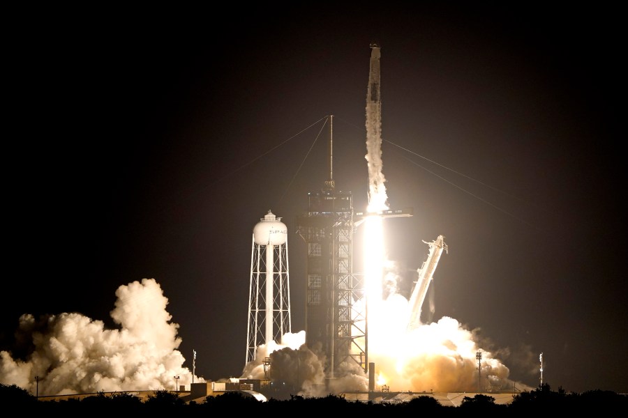 A SpaceX Falcon 9 rocket with the Crew Dragon capsule lifts off from Launch Pad 39A at the Kennedy Space Center in Cape Canaveral, Fla., on Nov. 10, 2021. (AP Photo/John Raoux)