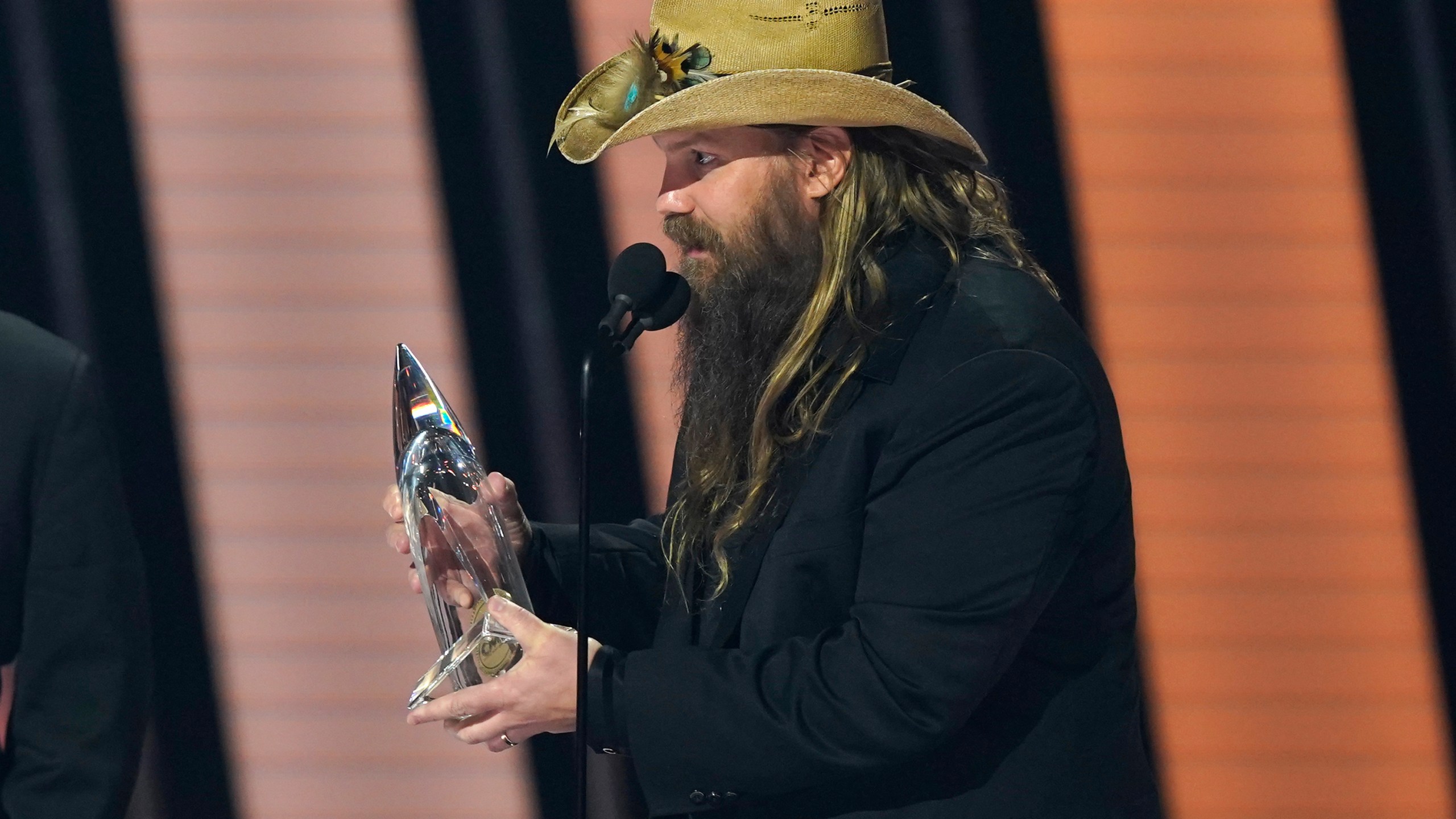 Chris Stapleton accepts the award for single of the year for "Starting Over" at the 55th annual CMA Awards on Nov. 10, 2021, at the Bridgestone Arena in Nashville, Tenn. (AP Photo/Mark Humphrey)