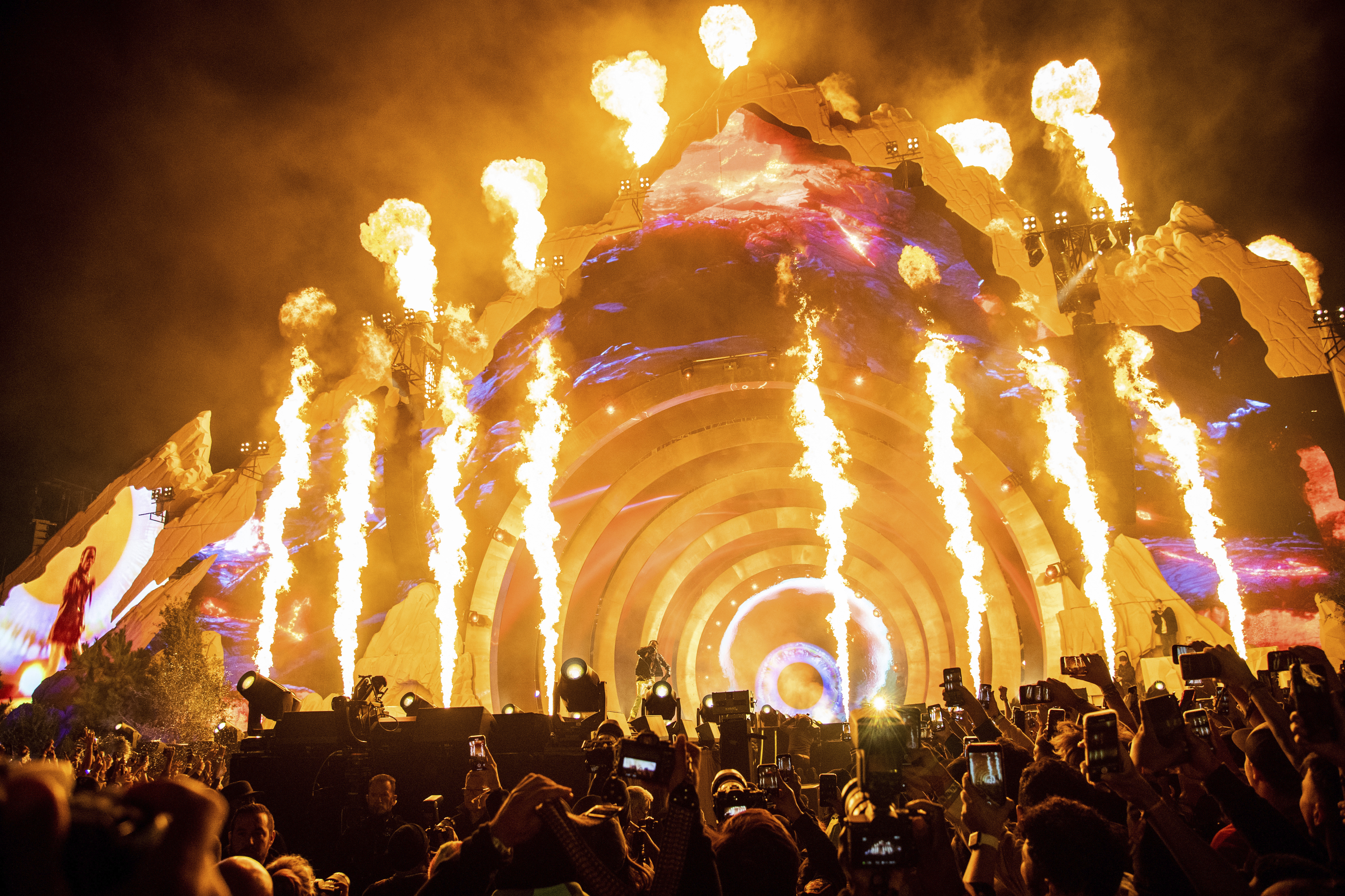 Travis Scott performs at Day 1 of the Astroworld Music Festival at NRG Park on Friday, Nov. 5, 2021, in Houston. Concertgoers described mounting anticipation for the headline rapper that led people to push toward the stage. (Photo by Amy Harris/Invision/AP, File)