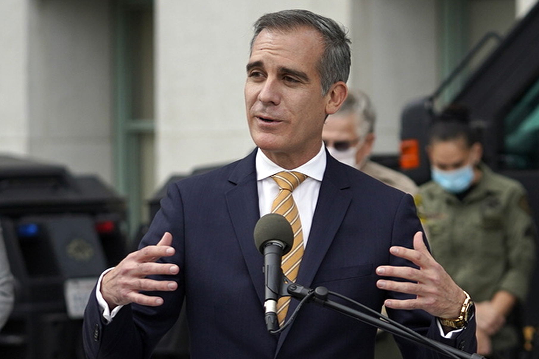 Los Angeles Mayor Eric Garcetti speaks at news conference outside the Hall of Justice in Los Angeles, on Jan. 19, 2021. (AP Photo/Damian Dovarganes, File)